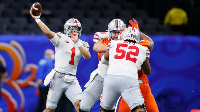 Ohio State Buckeyes quarterback Justin Fields (1) throws the ball against Clemson Tigers in the third quarter during the College Football Playoff semifinal at the Allstate Sugar Bowl